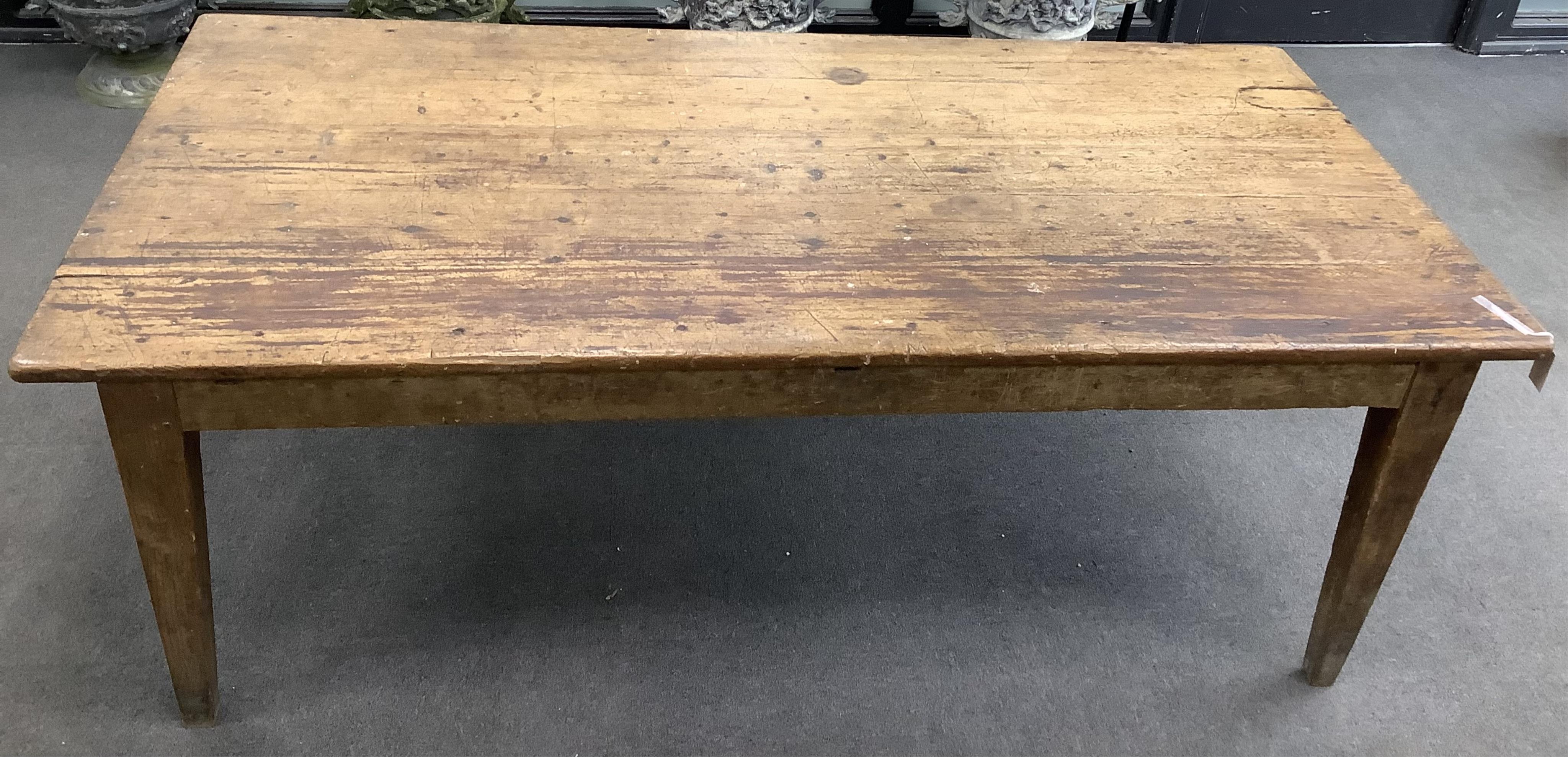 A 19th century French rectangular oak and pine kitchen table, width 198cm, depth 94cm, height 72cm. Condition - fair